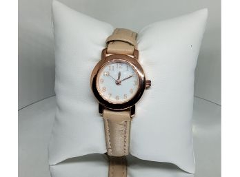 Ladies Rose Gold Tone Watch With Mauve Colored Band