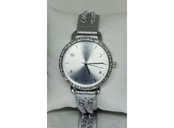 Ladies Silvertone Crystal Bezel Watch With Silver And Chain Band