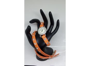 Geneva Silvertone With Crystal Bezel Wrap Around Watch With Crystal Rhinestones On Orange Band