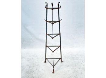 A Wrought Iron Serving Rack