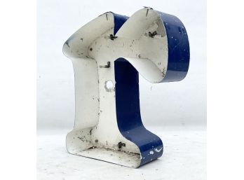 A Vintage Neon Sign Lowercase 'R'