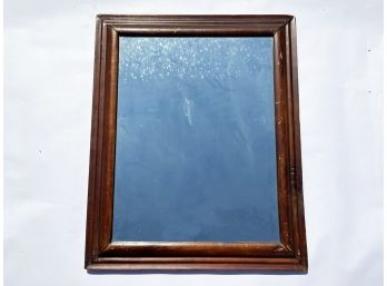 A Vintage Wood Framed Mirror