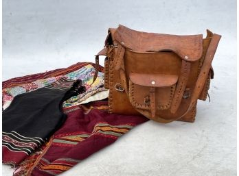 A Vintage Leather Bag And Various Textiles