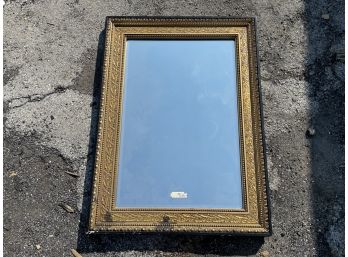 A Large Antique Gilt Wood Framed Mirror