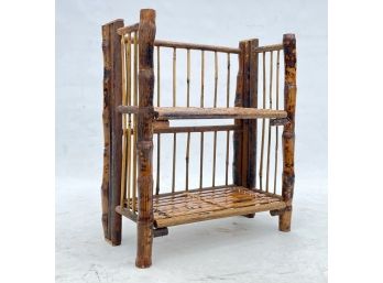 A Vintage Rattan Collapsible Rack