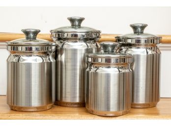 A Set Of Four Graduated Tramontina Canisters