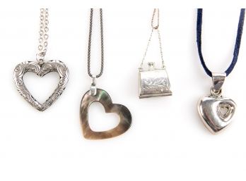 Four Sterling Silver Pendant Necklaces