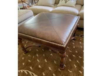 Isenhour Distressed Leather Ottoman With Nailhead Trim