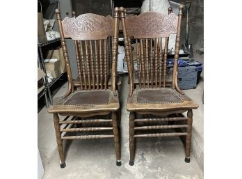 Four Pressed Back Side Chairs With Tooled Leather Seats
