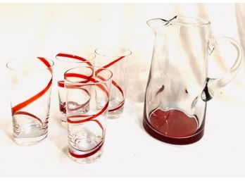 Vintage Dimpled Red Base Pitcher With Four Clear And Red Spiral Tumblers