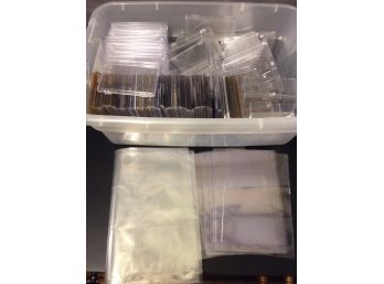 Box Filled With Assorted Trading Card Protective Cases