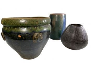 Three Dark Ceramic Pots