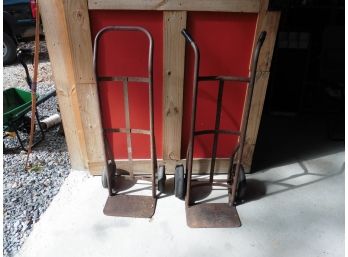 2 Heavy Duty Vintage Hand Trucks.  Solid Tires On One Surface Rust On Both.  Both Working