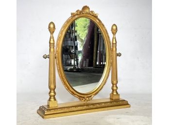 A Gilt Framed Shaving Or Vanity Mirror