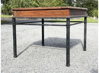 A Pine And Wrought Iron Coffee Table