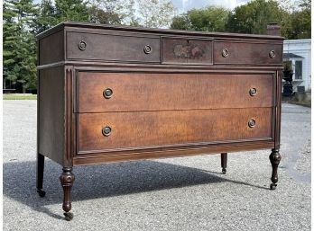 A Late 19th Century Mahogany Veneer And Carved Wood Dresser