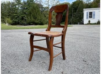 An Antique Mahogany Cane Seated Side Chair