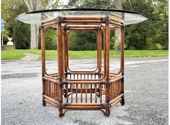 A Vintage Rattan Glass Top Dining Table