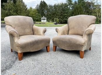 A Pair Of Leather Arm Chairs