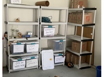 3 Plastic Shelving Units In Garage