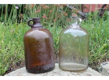 Two Vintage Very Nice Clear & Brown Amber Full Gallon Bottles Jugs