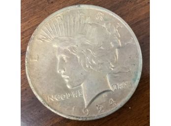 Silver 1924 Peace Dollar In Circulated Condition.