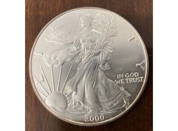 The 2000 American Silver Eagle Coin With Walking Liberty Dollar - One Ounce Of Silver In Plastic Case