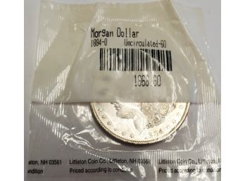 1884- O Morgan Dollar Uncirculated- 60. In Sealed Littleton Coin Co Packet