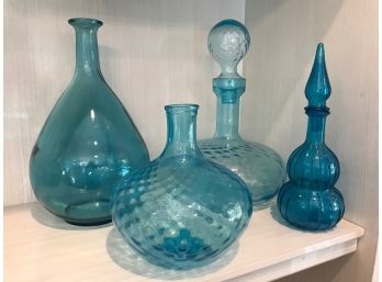Four Piece Blue Bottle & Decanter Collection