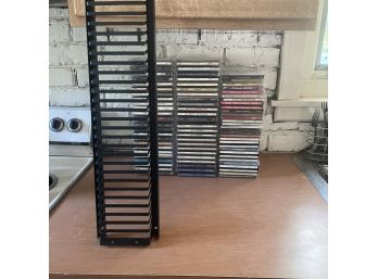 75 CDs With Storage Rack