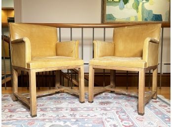 A Pair Of Mid Century Modern Leather Arm Chairs