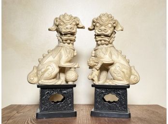 A Pair Of Vintage Chinese Foo Dogs On Bases