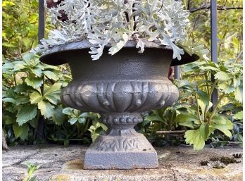 An Antique Cast Iron Urn