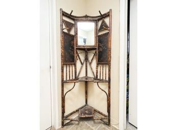 An Antique Tortoise Rattan Corner Shelf With Hand Painted Panels