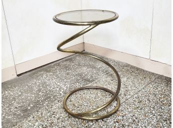 A Glamorous Vintage Glass Top Cocktail Table