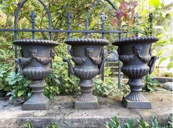 A Set Of 3 Cast Iron Planters