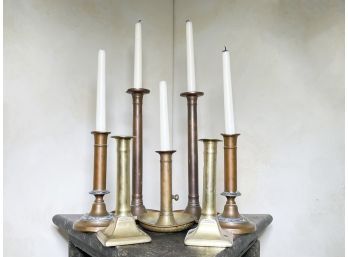 A Collection Of Art Copper And Alloy Candlesticks