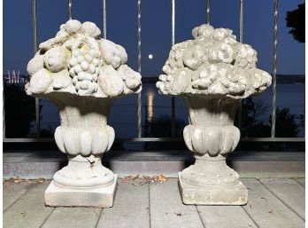 A Pair Of Cast Stone Garden Ornaments