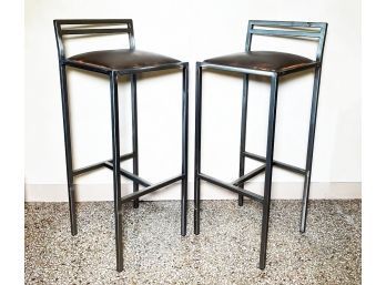 A Pair Of Brutalist Steel Upholstered Bar Stools In Leather