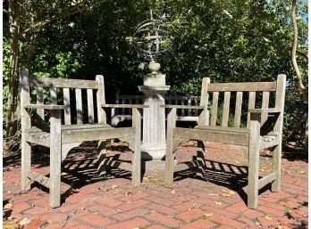 A Pair Of Vintage Weathered Teak Outdoor Arm Chairs