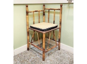 A Vintage Rattan And Oak Corner Seat