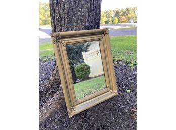 A Vintage Mirror In A Gilt Frame