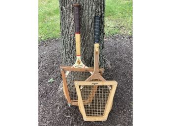 A Pair Of Vintage Wooden Tennis Rackets