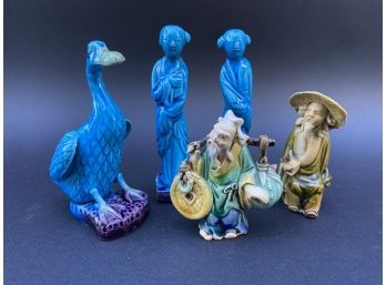 A Collection Of Vintage Asian Figurines