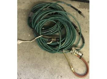 Two Air Hoses And Chucks