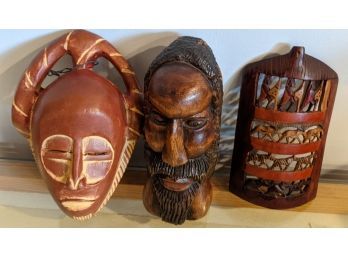 Indigenous Carving Of Man's Head, Tribal Mask And Animal Carving