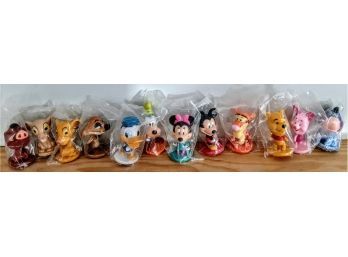 12 Mini Figurines, 4 Mickey Mouse Characters, 4 Lion King, And 4 Winnie The Pooh