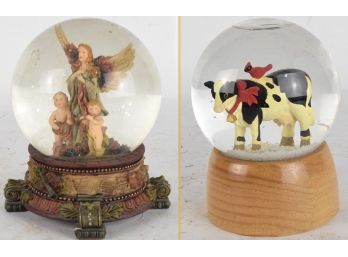 Pair Of Snow Globes - One With Music