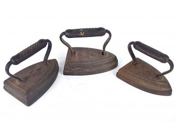 Set Of Three Antique Cast-Iron Sad Irons/Doorstops