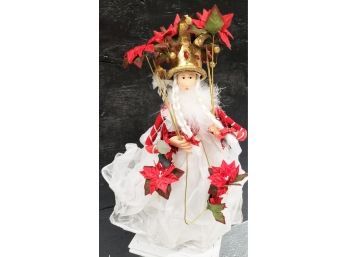 Adorable Christmas Fairy Carrying Poinsettias